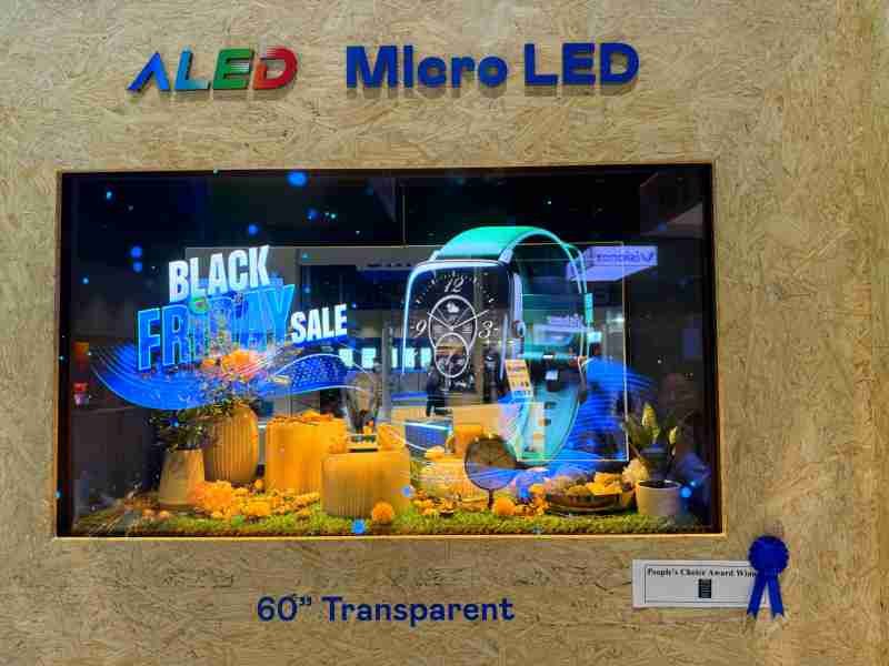 口袋牛店60吋高透明度Micro LED显示器获”最佳Micro LED技术应用奖”，，，，将Micro LED面板透明化之设计特性极致发挥，，，以可扩展性无缝拼接技术打造，，具备600 nits全画面亮度、、、、大于60%穿透率及超过NTSC 110%的优异广色域表现，，，可依需求灵活应用于各种场域